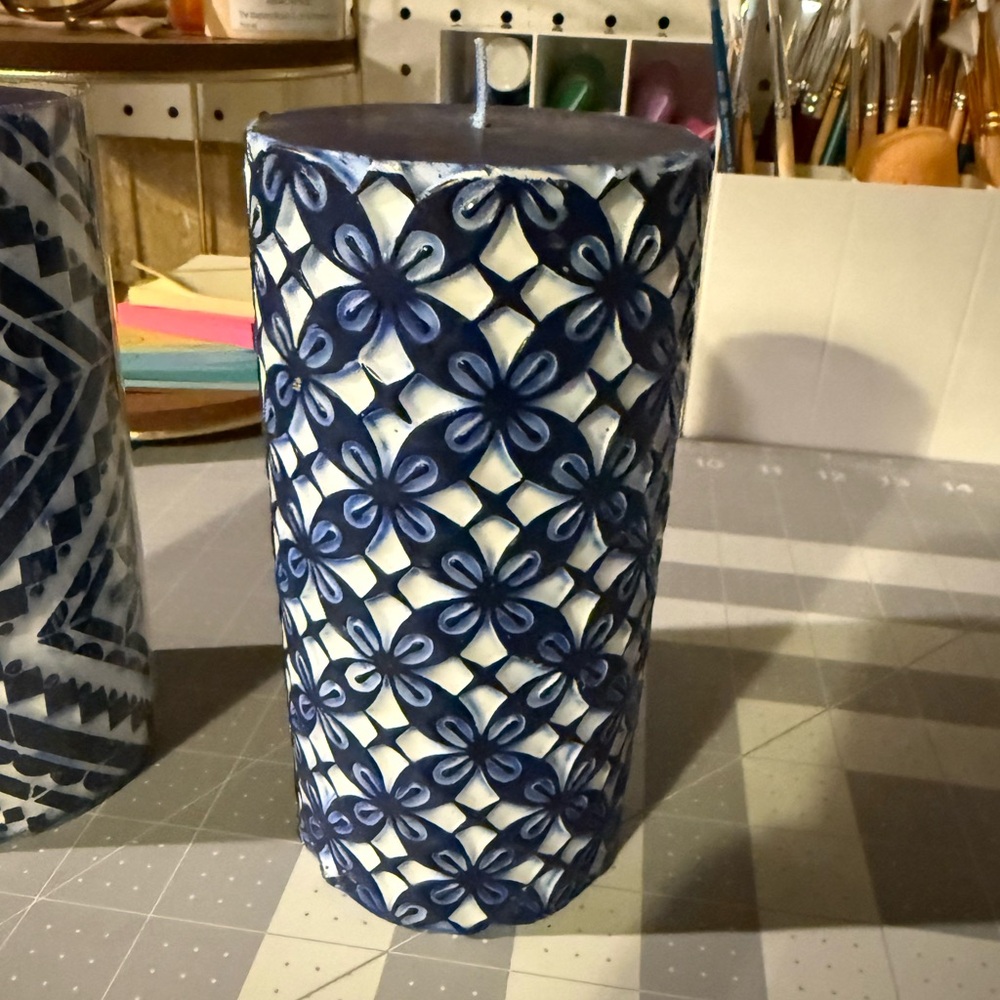 NEW. Gorgeous Blue and White Patterned Wax Candle. Brand new. Approx 6” tall